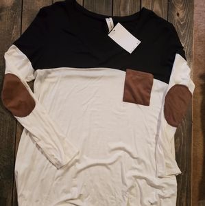 Black and white blouse with suede patches